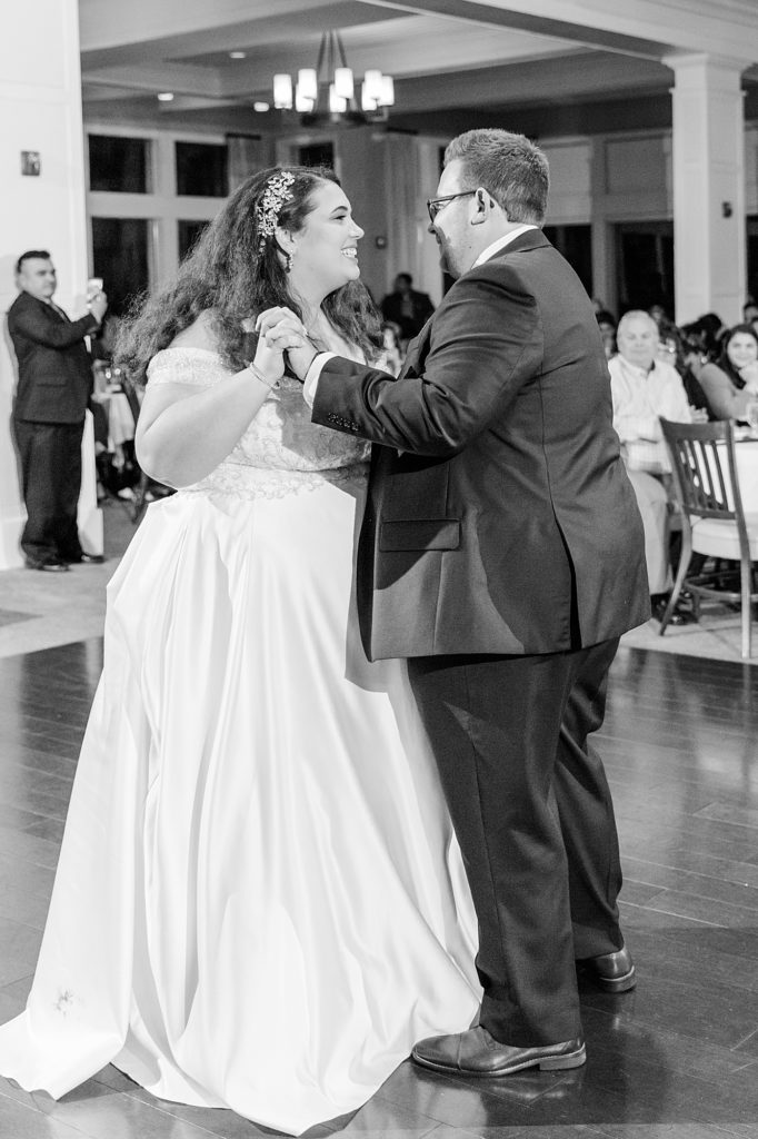black and white photo of the first dance between the bride and the groom on their wedding day at the verandah golf club in fort myers florida.
