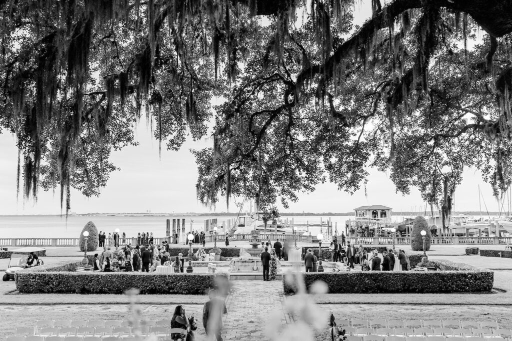 black and white wide shot during an outdoor cocktail hour at Epping Forest Yacht Club in Jacksonville, Florida, captured by Snapshots by Gabriela