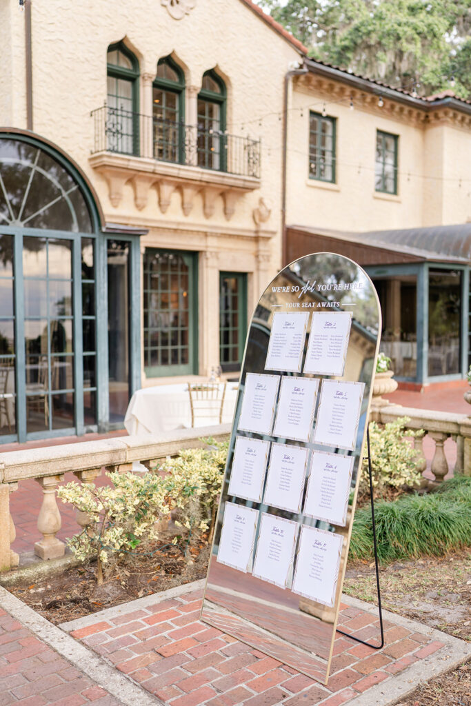 clear acrylic table number display at an outdoor wedding reception at Epping Forest Yacht Club in Jacksonville, Florida, captured by Snapshots by Gabriela