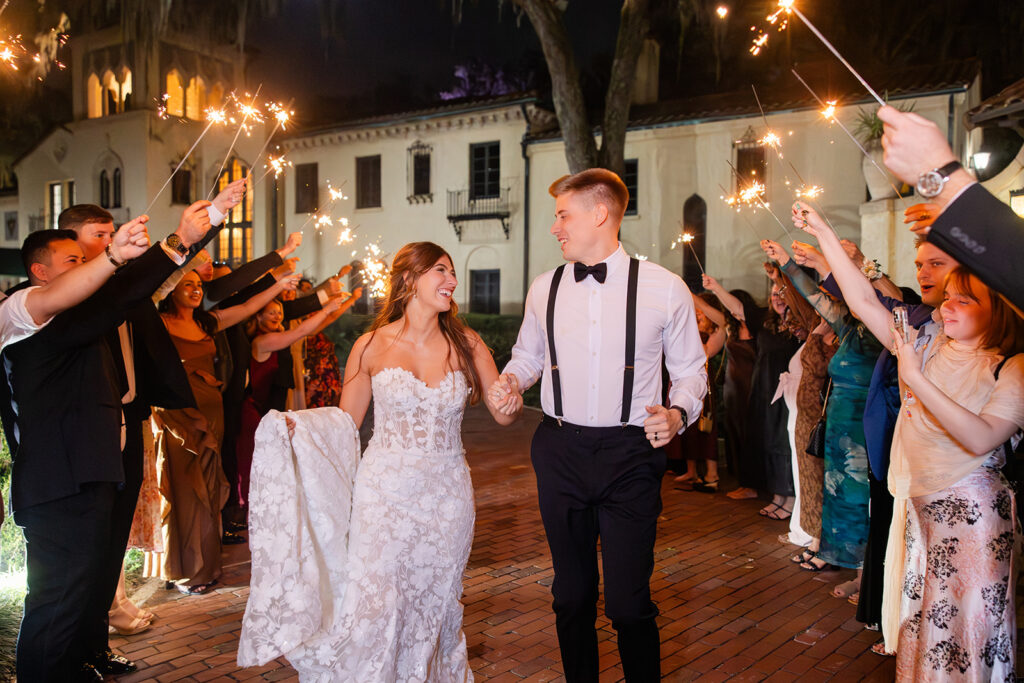 bride and groom sparkler exit at an outdoor wedding reception at Epping Forest Yacht Club in Jacksonville, Florida, captured by Snapshots by Gabriela