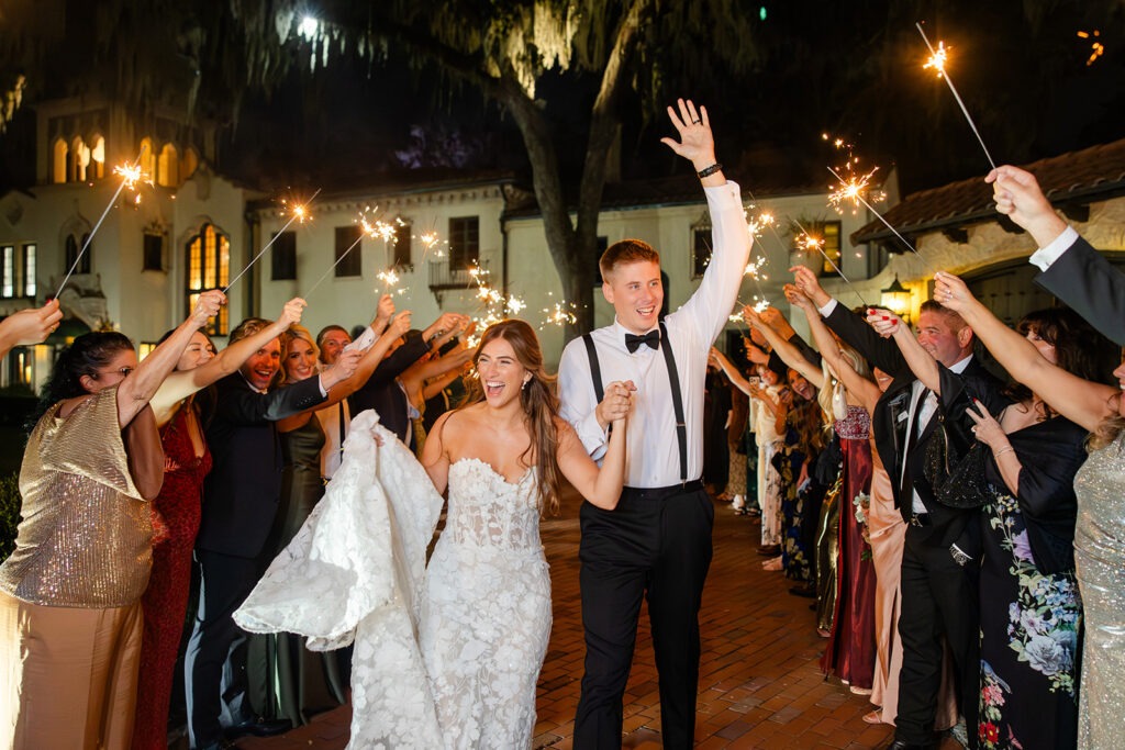 bride and groom sparkler exit at an outdoor wedding reception at Epping Forest Yacht Club in Jacksonville, Florida, captured by Snapshots by Gabriela