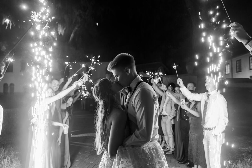 bride and groom sparkler exit at an outdoor wedding reception at Epping Forest Yacht Club in Jacksonville, Florida, captured by Snapshots by Gabriela