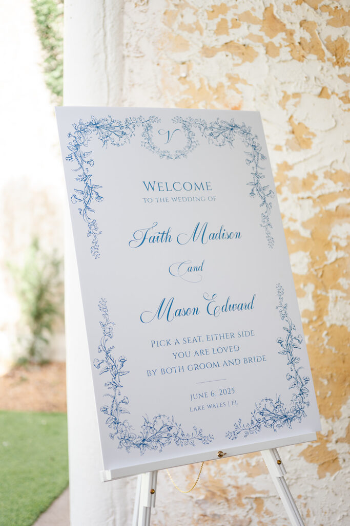 dusty blue wedding signage at Bella Cosa Lakeside in Lake Wales Florida