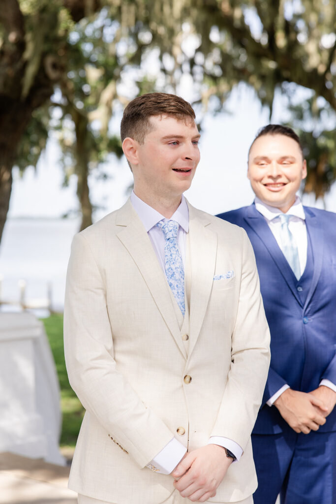 groom's face at an outdoor wedding ceremony on the lawn at Bella Cosa Lakeside in Lake Wales Florida