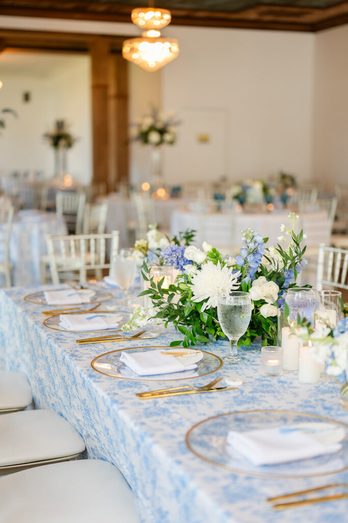 dusty blue wedding reception tablescape at Bella Cosa Lakeside in Lake Wales Florida