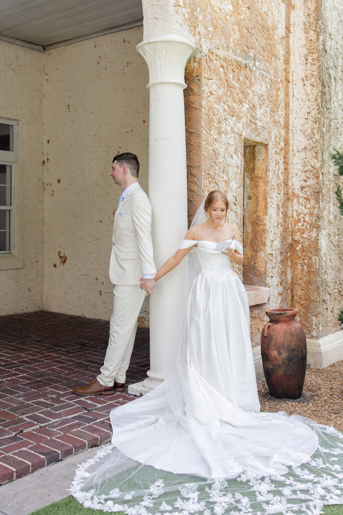 first touch with the bride and groom at a wedding at Bella Cosa Lakeside in Lake Wales Florida