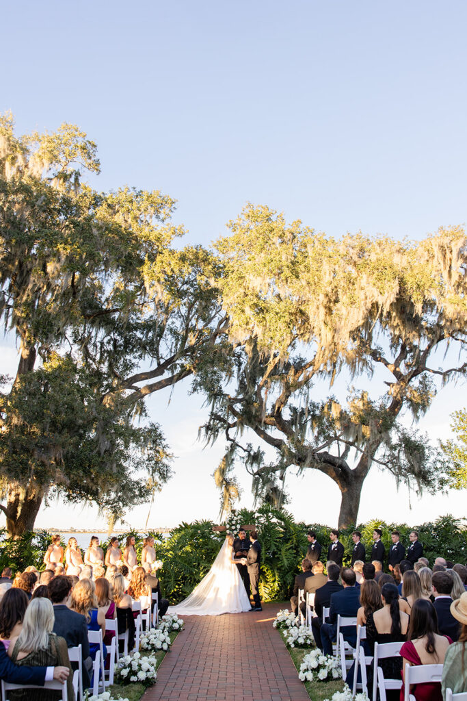 outdoor wedding ceremony at Adams Estate in Lake Alfred, Florida, captured by Snapshots by Gabriela