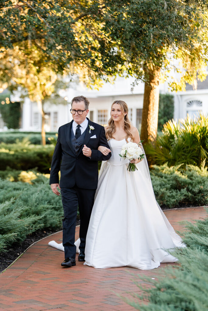 outdoor wedding ceremony at Adams Estate in Lake Alfred, Florida, captured by Snapshots by Gabriela