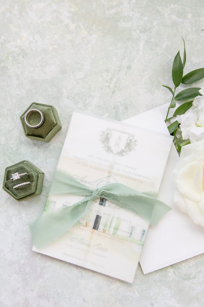 wedding invitation suite flat lay at an outdoor wedding at Adams Estate in Lake Alfred, Florida, captured by Snapshots by Gabriela