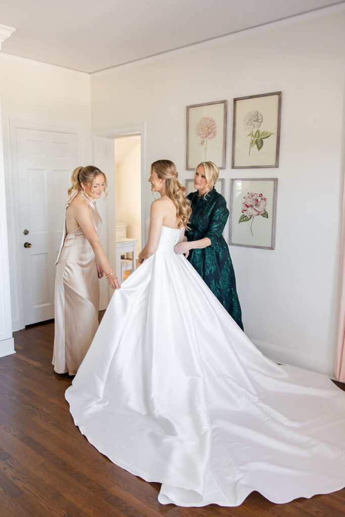 bride getting ready at an outdoor wedding at Adams Estate in Lake Alfred, Florida, captured by Snapshots by Gabriela