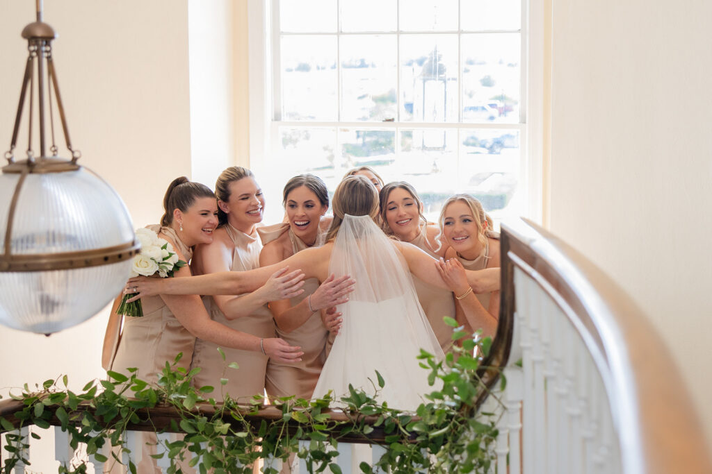 bridesmaids first look at an outdoor wedding at Adams Estate in Lake Alfred, Florida, captured by Snapshots by Gabriela