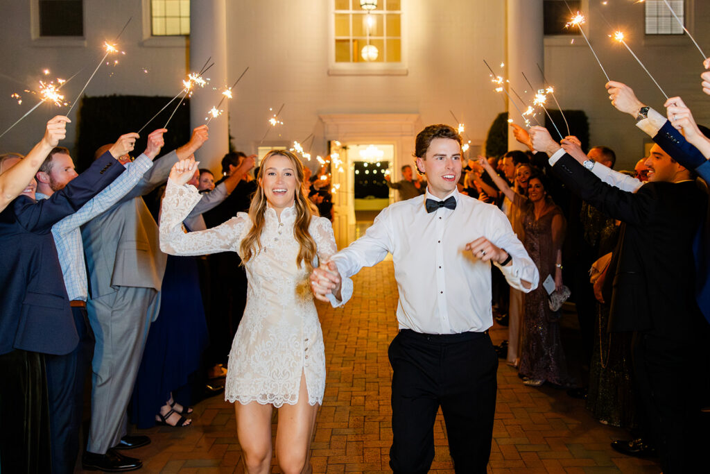 bride and groom sparkler exit at a wedding reception at Adams Estate in Lake Alfred, Florida, captured by Snapshots by Gabriela