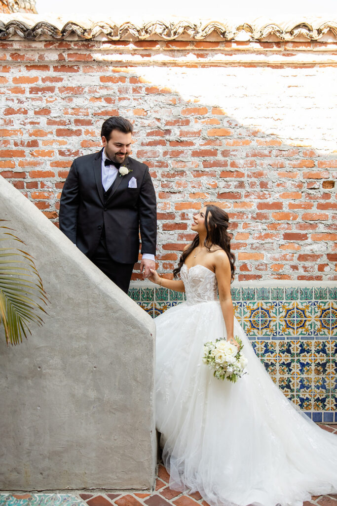 bride and groom portrait at historic estate wedding venue Casa Feliz in Winter Park, Florida, photographed by Snapshots by Gabriela