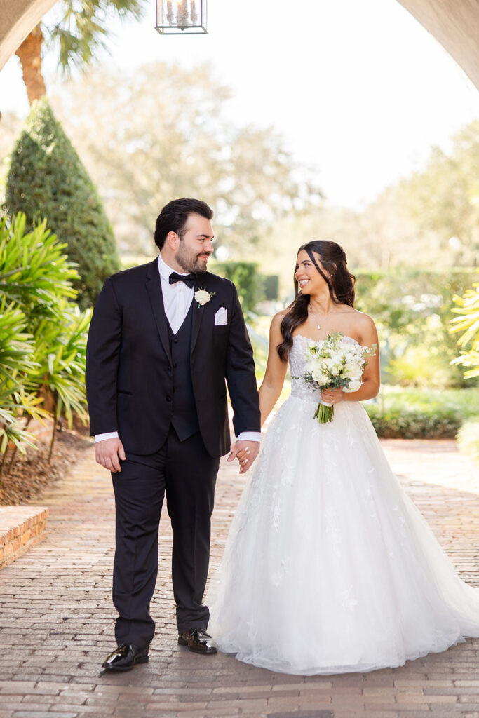 bride and groom portrait at historic estate wedding venue Casa Feliz in Winter Park, Florida, photographed by Snapshots by Gabriela
