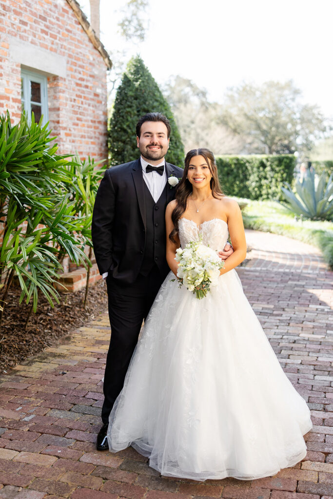 bride and groom portrait at historic estate wedding venue Casa Feliz in Winter Park, Florida, photographed by Snapshots by Gabriela