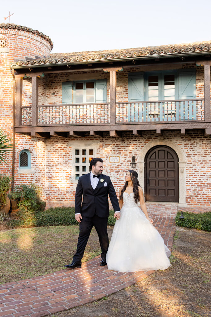 bride and groom golden hour portrait at historic estate wedding venue Casa Feliz in Winter Park, Florida, photographed by Snapshots by Gabriela