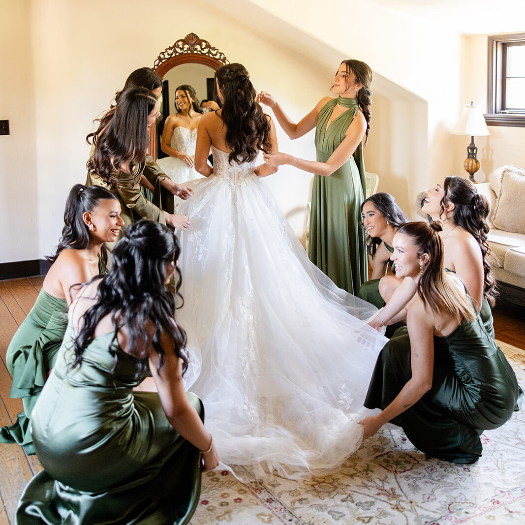 bride with bridesmaids at historic estate wedding venue Casa Feliz in Winter Park, Florida, photographed by Snapshots by Gabriela