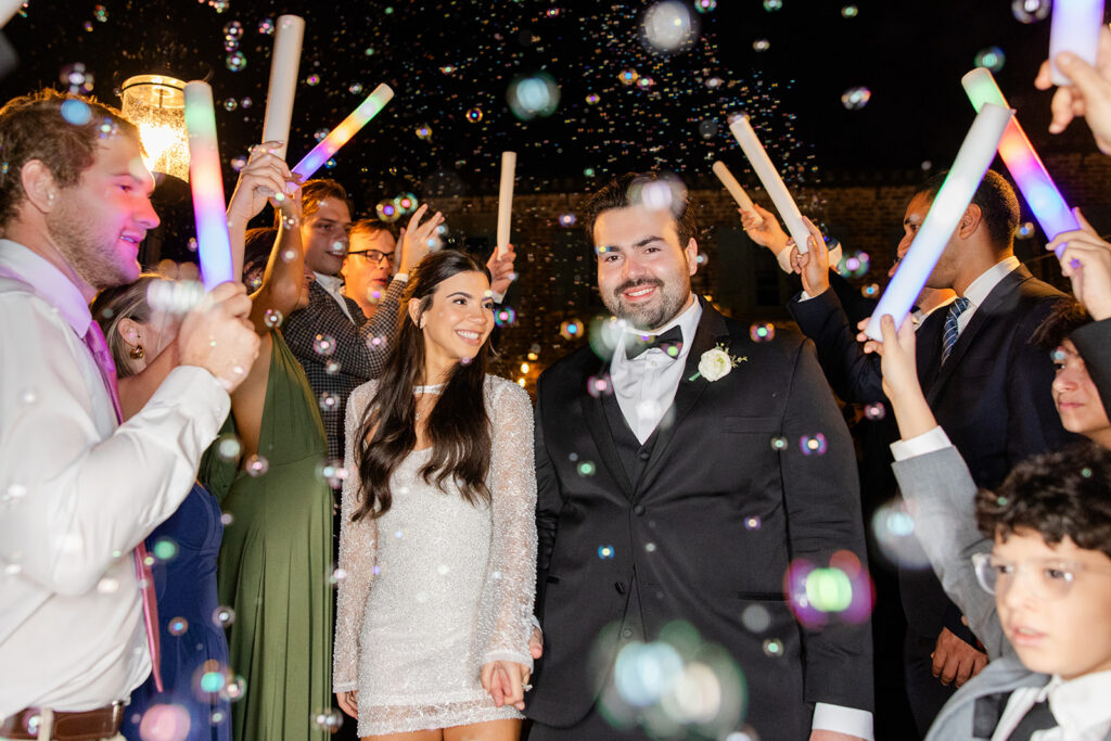 bride and groom during their bubble exit at historic estate wedding venue Casa Feliz in Winter Park, Florida, photographed by Snapshots by Gabriela