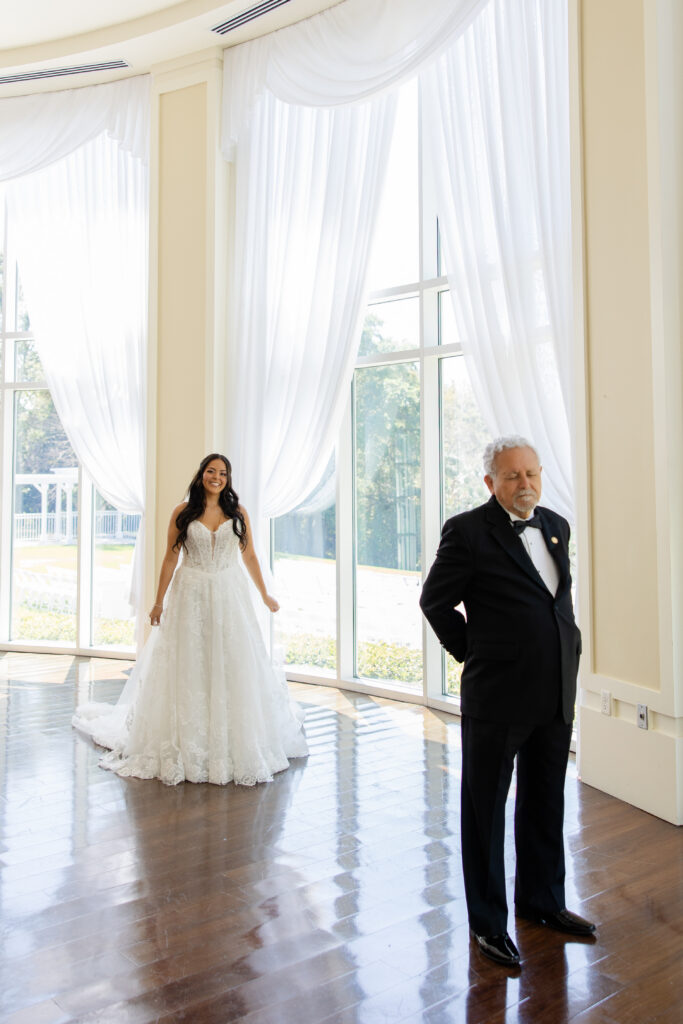 bride and father first look at a spring wedding at Lake Mary Events Center, captured by Snapshots by Gabriela
