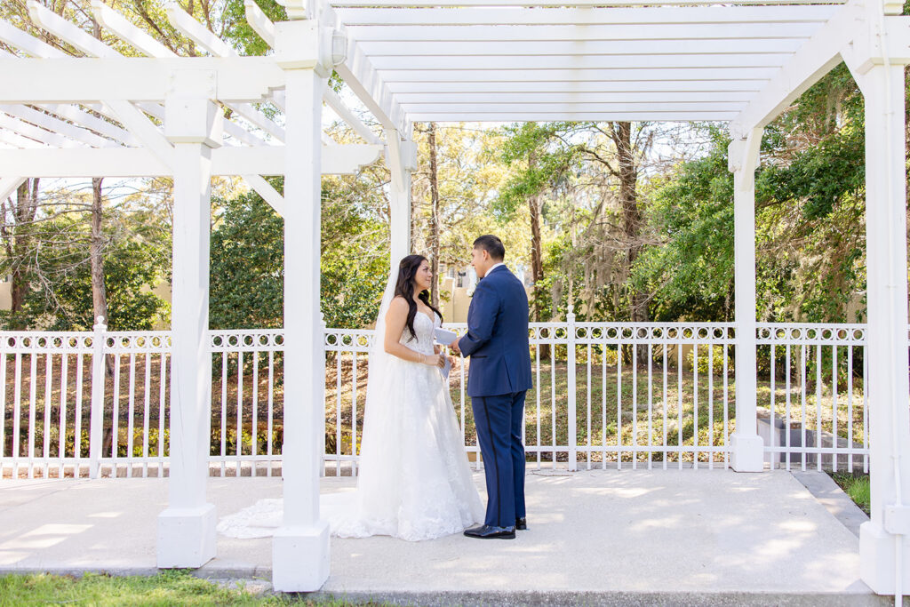 bride and groom first look at a spring wedding at Lake Mary Events Center, captured by Snapshots by Gabriela