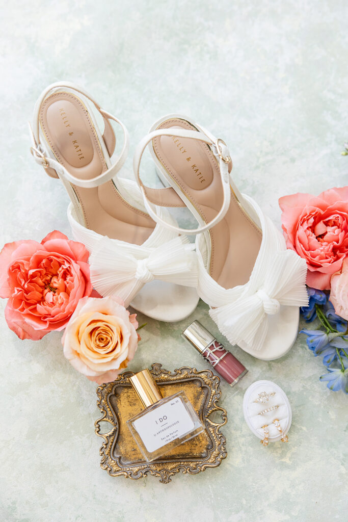coral, peach, and dusty blue wedding details