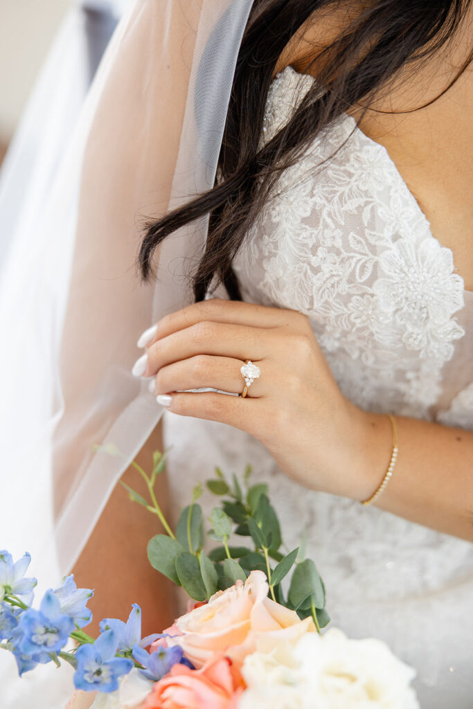coral, peach, and dusty blue wedding details