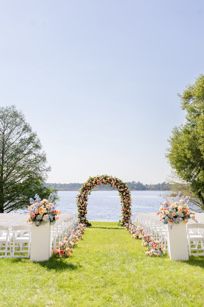 outdoor wedding ceremony setup with spring flowers at Lake Mary Events Center, captured by Snapshots by Gabriela
