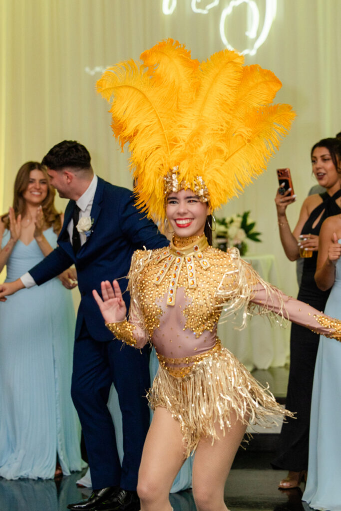 hora loca dancer at a spring wedding reception at Lake Mary Events Center, captured by Snapshots by Gabriela