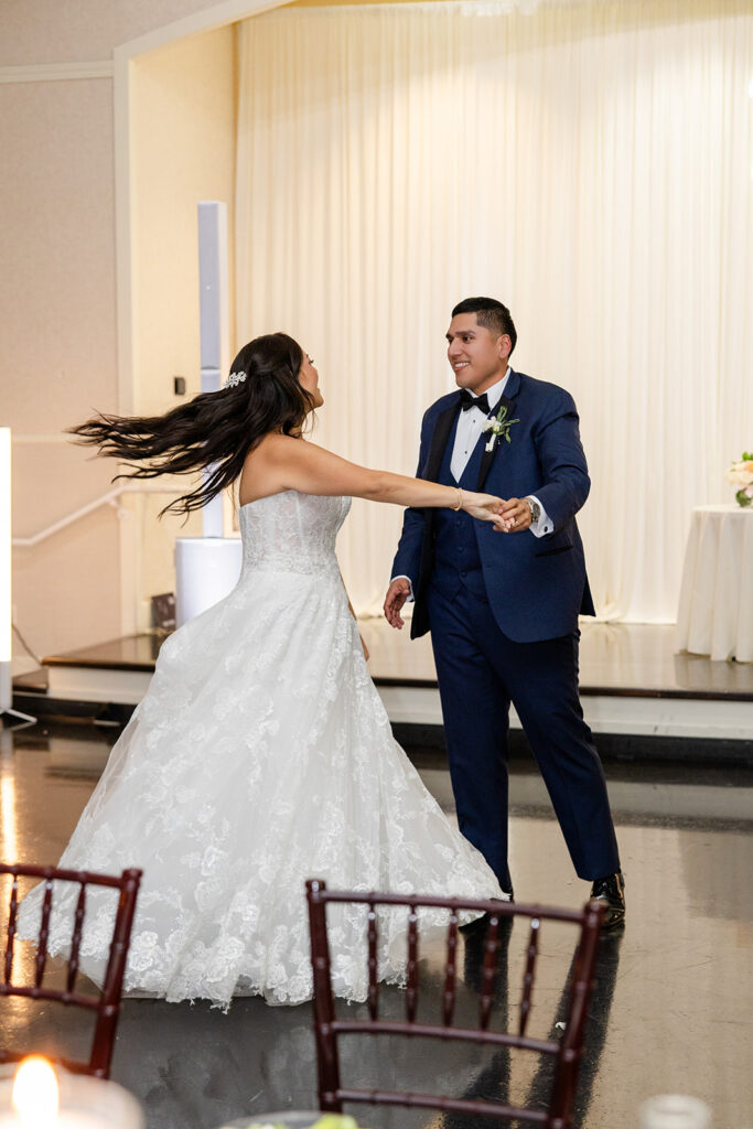bride and groom first dance at a spring wedding at Lake Mary Events Center, captured by Snapshots by Gabriela