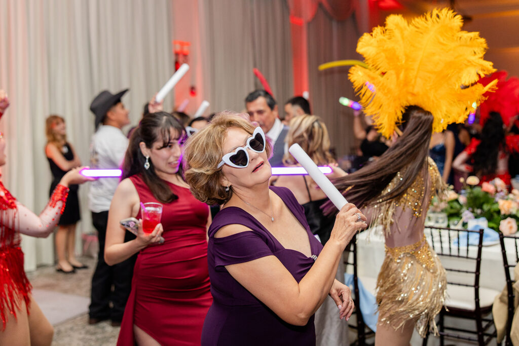 guests dancing at a spring wedding reception at Lake Mary Events Center, captured by Snapshots by Gabriela