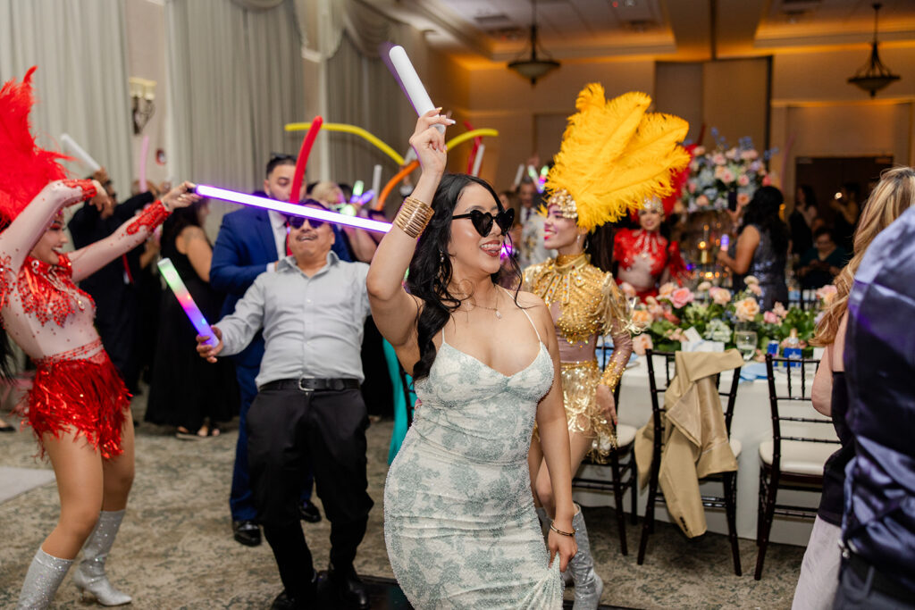guests dancing at a spring wedding reception at Lake Mary Events Center, captured by Snapshots by Gabriela