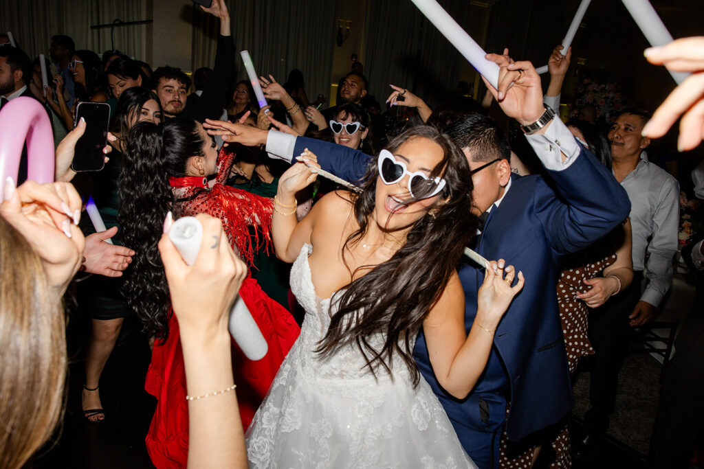 guests dancing at a spring wedding reception at Lake Mary Events Center, captured by Snapshots by Gabriela